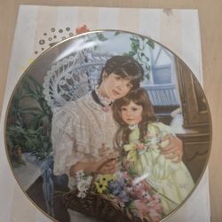 vintage limited edition collector plate titled "A Cherished Time" from the Reco Collection, featuring artwork by Sandra Kuck. 