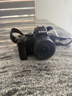 Nikon Z50 Mirrorless Camera + NIKKOR 16-50mm Lens + 3 Batteries + Charger