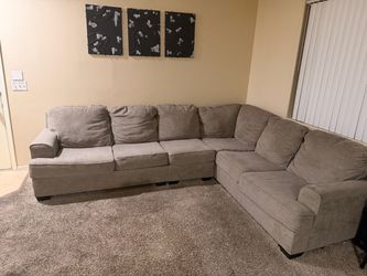 Grey 6 seated L shaped couch- needs to go