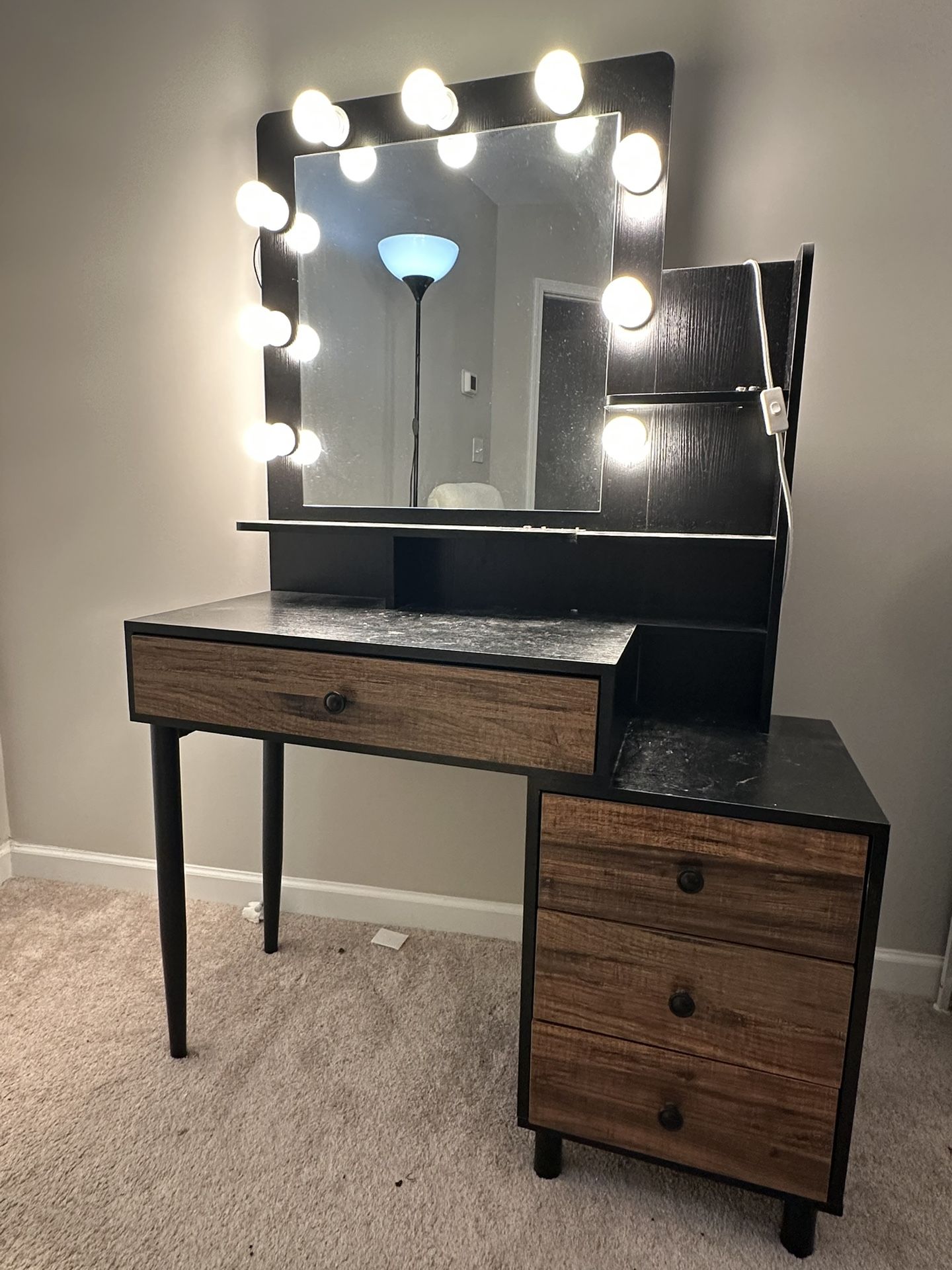 Vanity With Mirror And Bright Lights