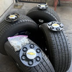 P265/70/R17 (2) Tires Dextero (1) Cooper (1) Nitto & Chevy Silverado wheels 