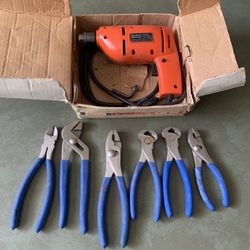 Quarter inch electric drill and hand tools 