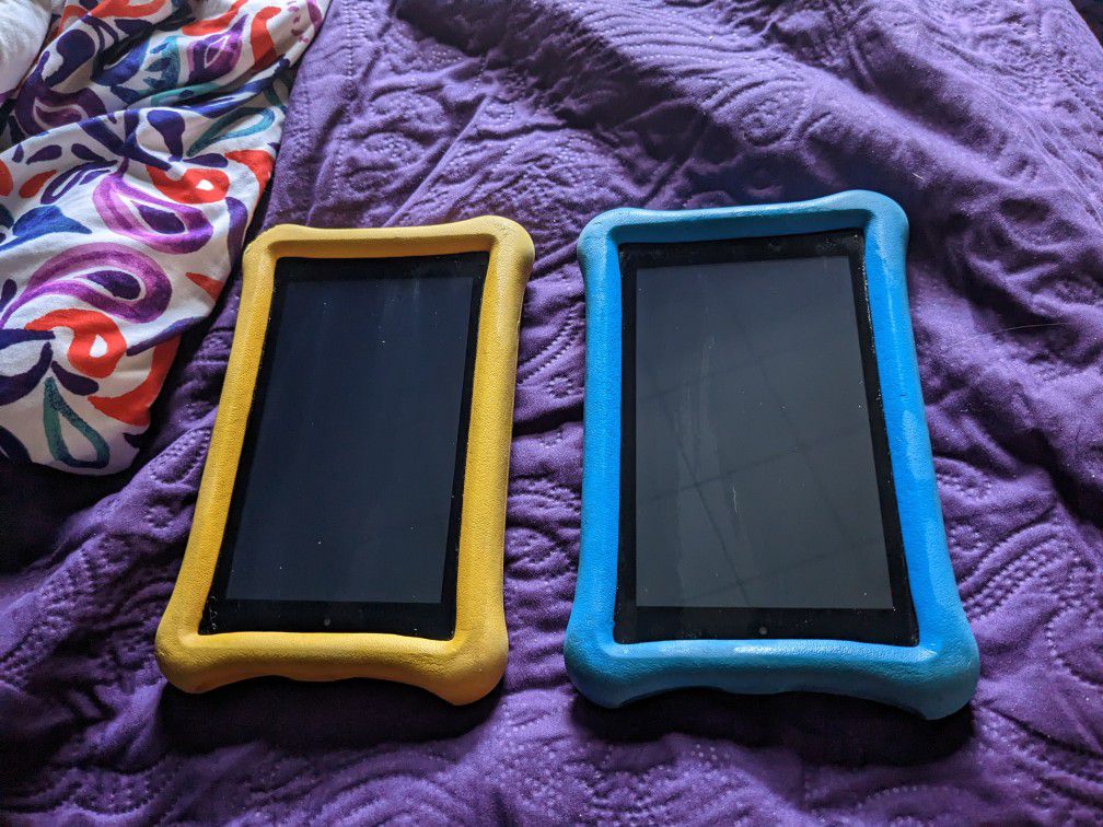 Two Kindle fire 7 Tablets