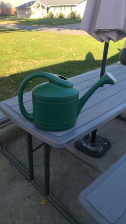 Green Plastic Watering Can