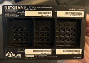 Netgear modem/router combo (c6230) with original power adapter.