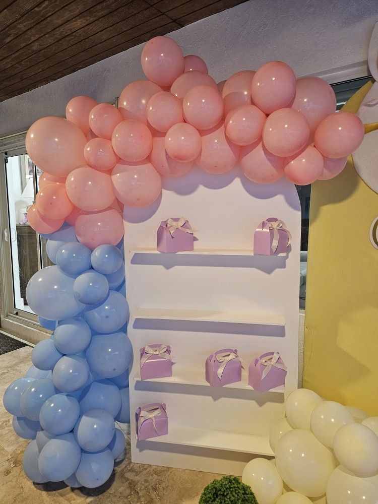arch back drop with shelves