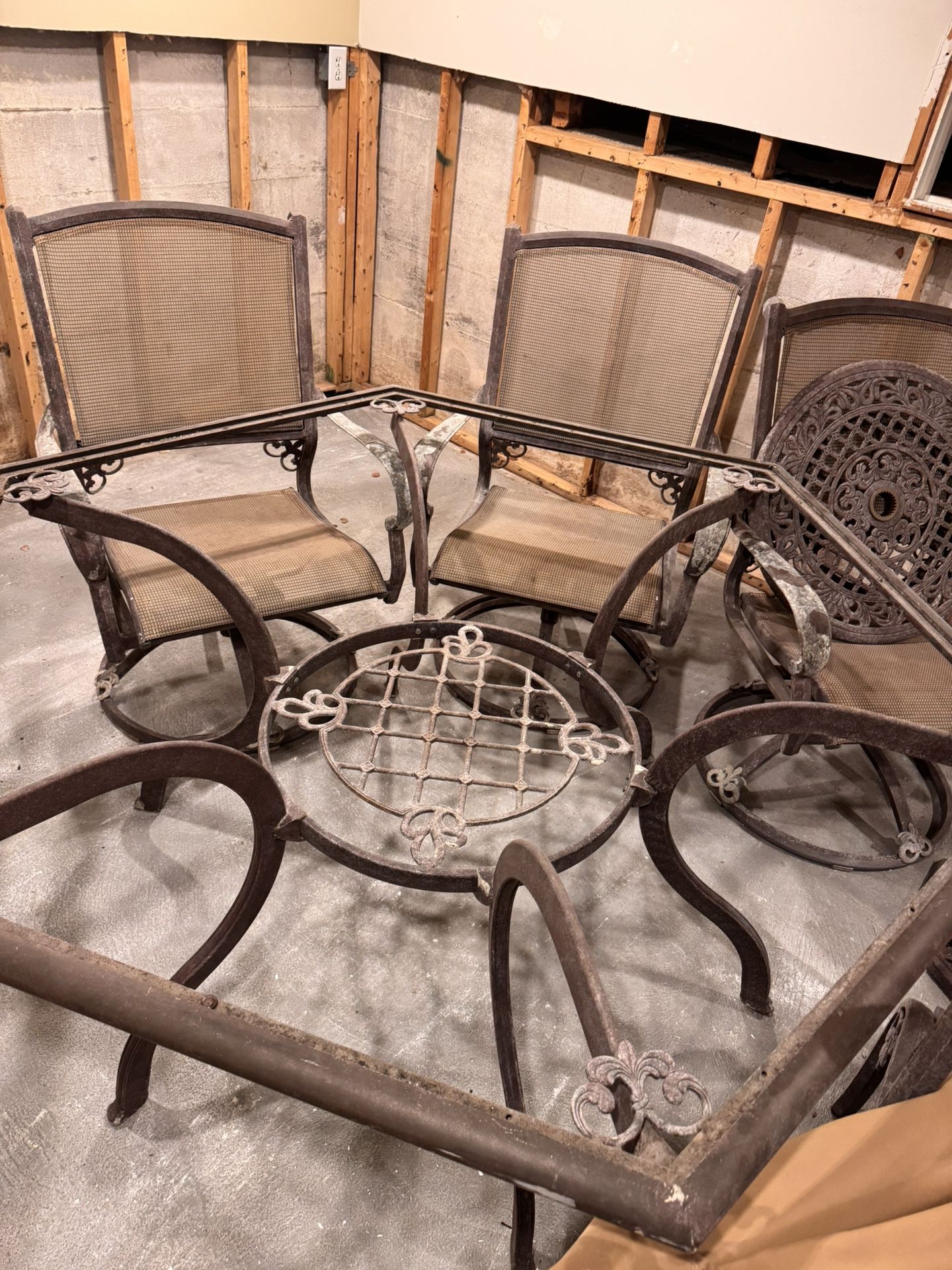 Heavy Patio Set Large Table With Glass Top And 5 Chairs Plus Side Table With Glass Top And Two Smaller Chairs