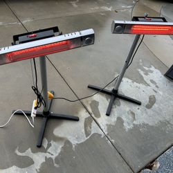 Two Space Heaters With Lights and stand