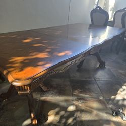 Formal Dining Room Set with Intricate Wood Carvings