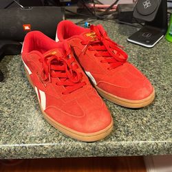 Red Reebok sneakers