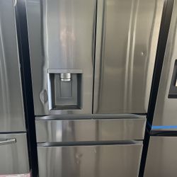 LG FOUR DOOR REFRIGERATOR STAINLESS STEEL 
