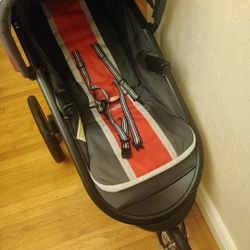 Red Graco jogging Stroller