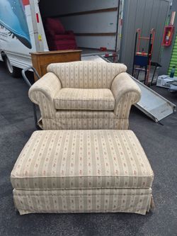 Upholstered Armchair and Ottoman Set