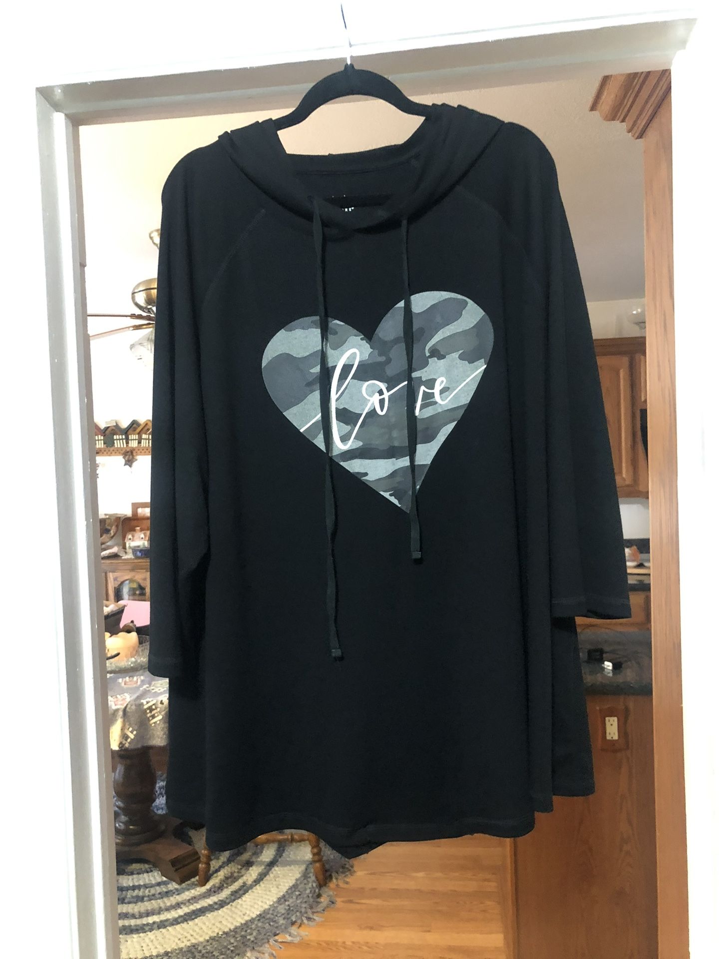 Women’s Size 26 / 28 Hooded Tunic Length 3/4 Length sleeves. Color Black the front has a heart says “Love”. Brand New Never Worn