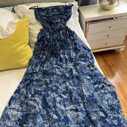 Fashion Nova Strapless   Maxi dress Size Medium , Elastic at the waist and back. And the skirt part has two openings in the front, new with tags.