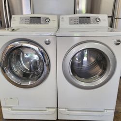 Lg Washer And Dryer Set On Pedestals 