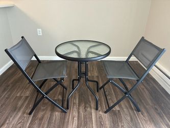 Glass table and chairs set