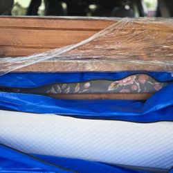 Wood-framed Bed And Bookcase
