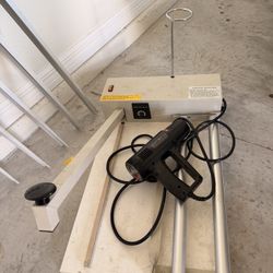 I-Bar shrink wrap machine with a heat gun. 