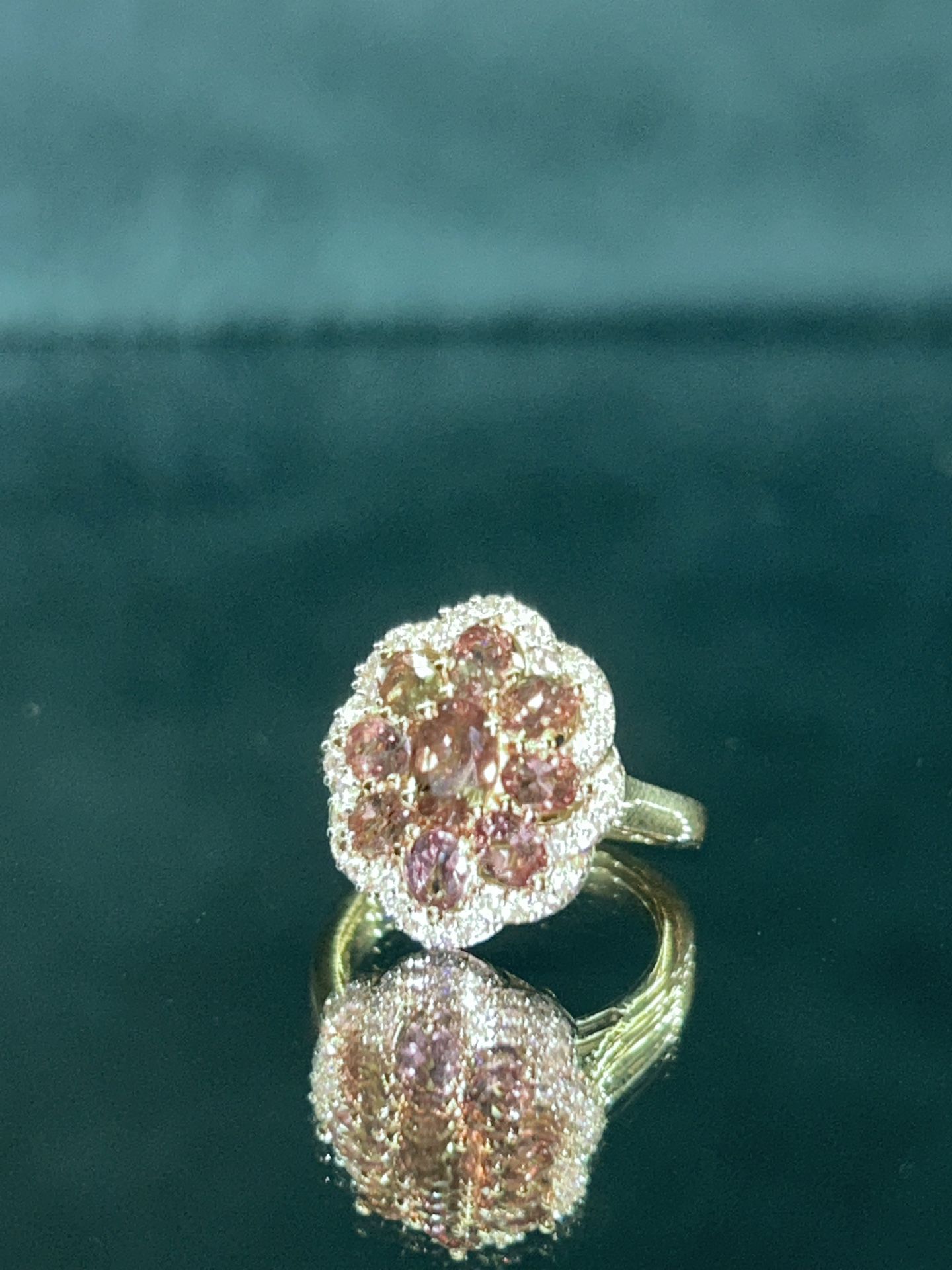 Beautiful color change garnet and moissanite imperial bloom ring