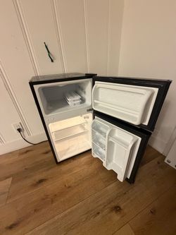 Arctic King Black Mini Fridge with Top Freezer for just 120$