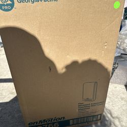 Touchless towel dispenser