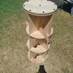 Rotating bookshelf stand