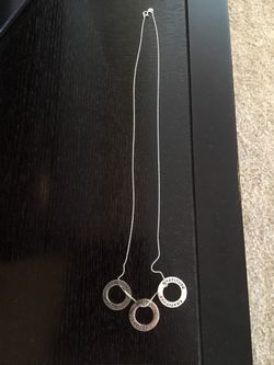 Silver necklace with 3 charms