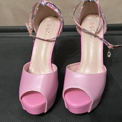 Brand new pink heels w/floral design in the back