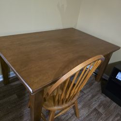 Oak dinning table and 4 chairs