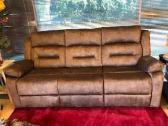 Tan manual sofa