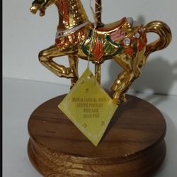 HAND PAINTED PORCELAIN - WOODEN BASE CAROUSEL FIGURINE 7"