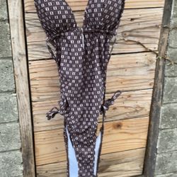 Women’s bathing suit, one piece, brown, and white size medium