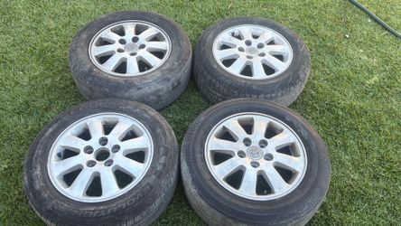Toyota Camry 15 Inch aluminum wheels with old tires, Fits Avalon, Solara, and Lexus cars