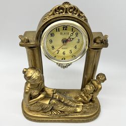 Vintage Eleco Quartz clock with women n Children
