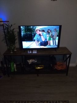Flat screen TV with TV stand