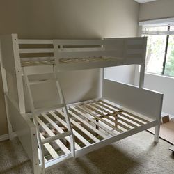 Twin/full bunk bed. Available in espresso & white. Assembly required. Assembly not included. Tax included. Free local delivery. $350 bunk bed only. $5