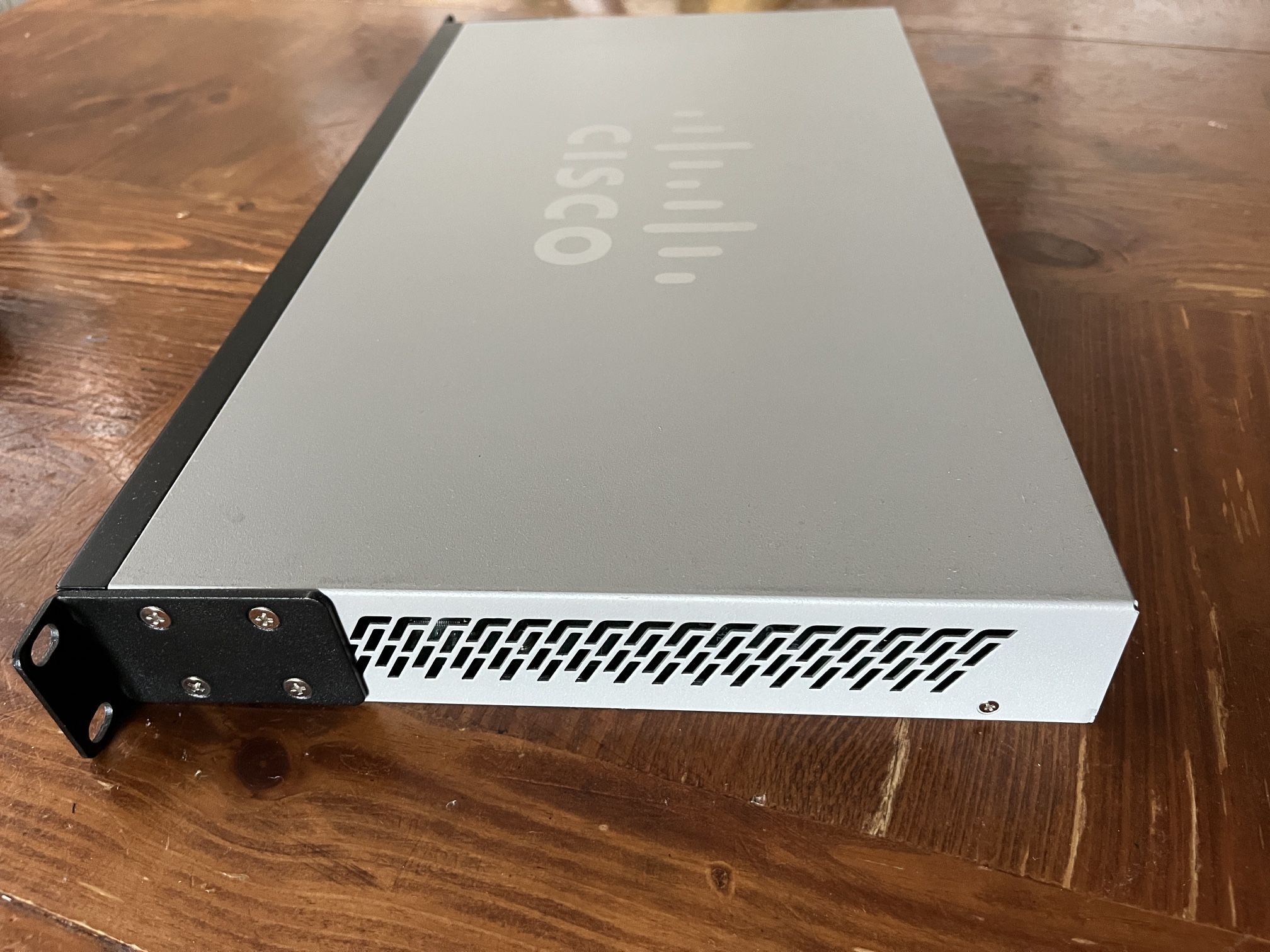 CISCO DESIGNED SG200 26 Gigabit Ethernet Smart Switch with 24 10/100/1000 Ports and 2 Combo Mini GBIC Ports (SLM2024T NA), one size