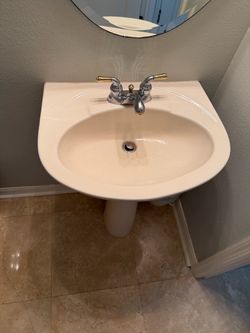 Pedestal sink and Moen faucet