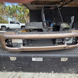 F250 FRT BUMPER CROME COVERED BY TAN WRAP