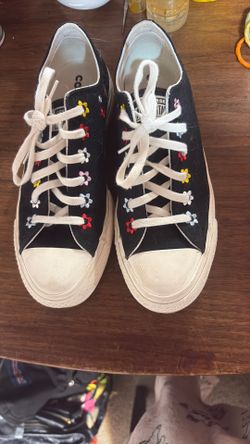 black Converse Chuck Taylor All Star Lift Platform Low sneakers feature embroidered floral details