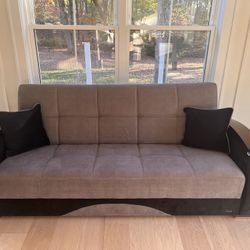 SOFA BED IN GRAY AND BLACK COLOR
