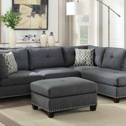 Brand New Charcoal Sectional and Ottoman Set