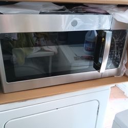 New GE brand stainless steel over of range microwave