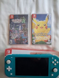 Nintendo switch lite w/ 2 pokemon games