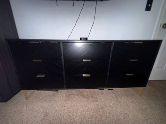 Modern Black 9-Drawer Dresser with Gold Base