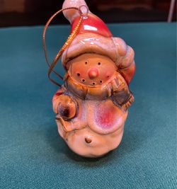 Vintage hand painted and highly glazed ceramic snowman ornament