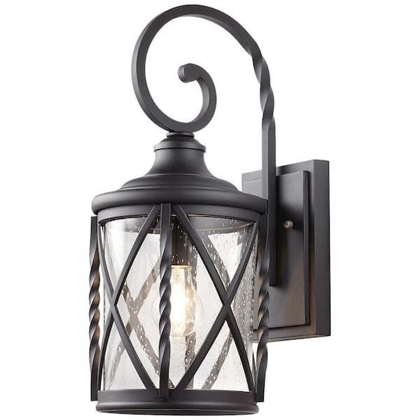 Home Decorators
Collection Walcott Manor 18.75 in. 1-
Light Black Industrial Outdoor Wall
Lantern Sconce with Clear Seeded
Glass