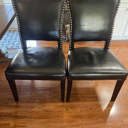4 Black Leather chairs 