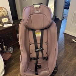 A Baby Car Seat With Adjustable Head Rest